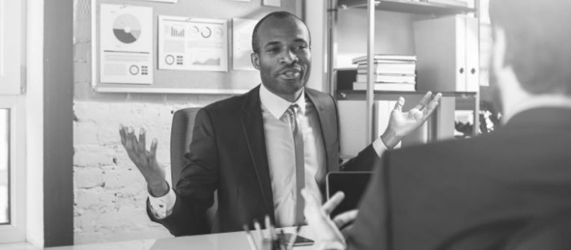 Portrait of professional young african businessman in suit